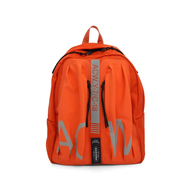 Casual minimalist backpack for simple daily carry -Eastpak Large Backpack in Rich Orange/Light Grey