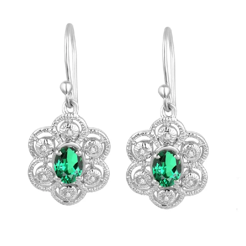 Rings with carved turquoise for artistic flair -Sterling Silver with Green Emerald and Natural White Topaz Dangle Earring