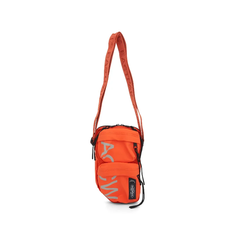 Durable travel backpack with reinforced stitching strength -Eastpak Camo Pouch Rich Orange/Light Grey