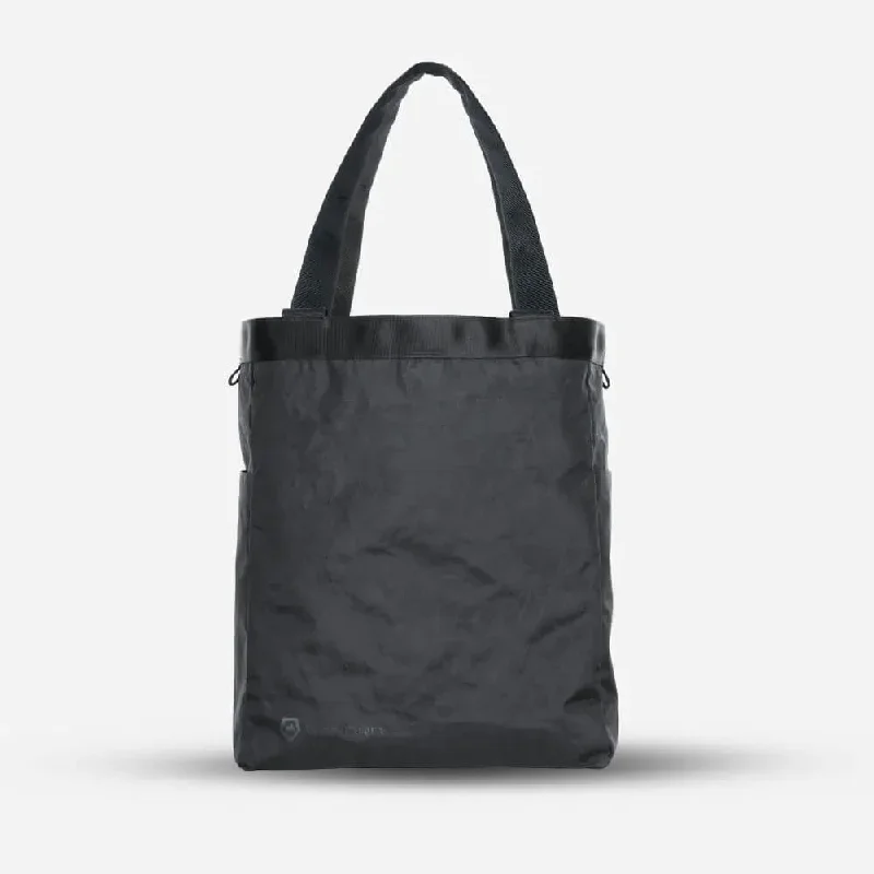 Fashion-forward backpack for bold street style -Wandrd Tote Backpack