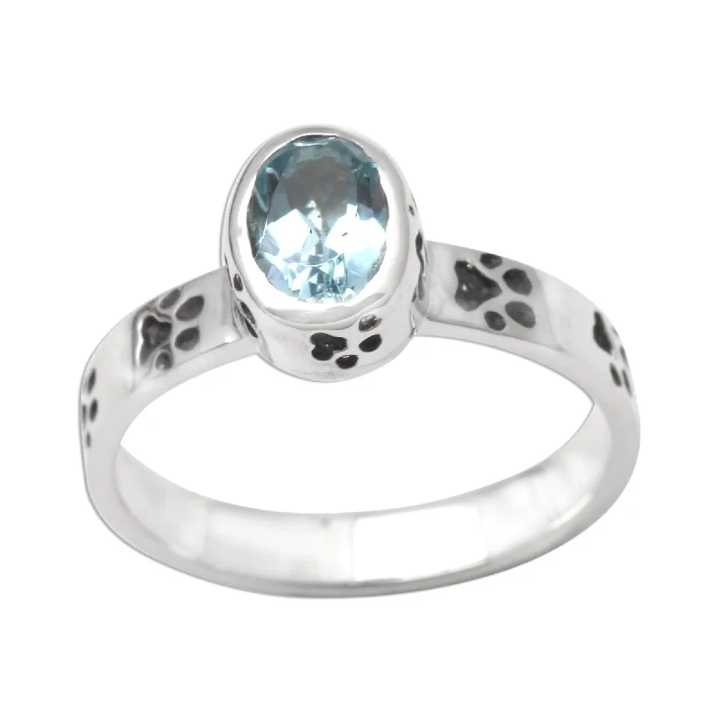 Rings with rough sapphire for rugged chic -Novica Handmade Pawprints Blue Topaz Single-Stone Ring