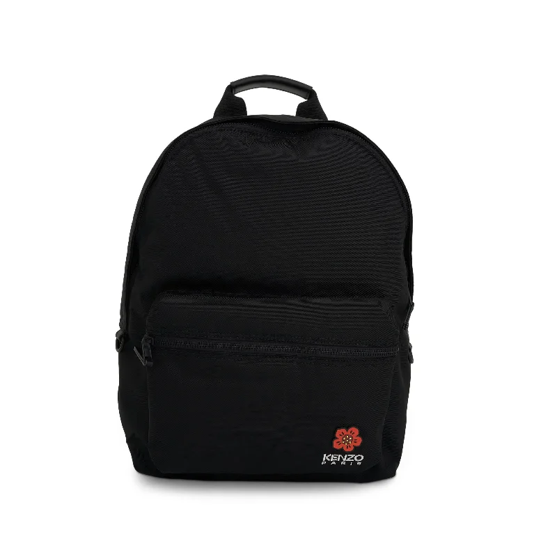 Small sling backpack for quick city errands -Crest Backpack in Black